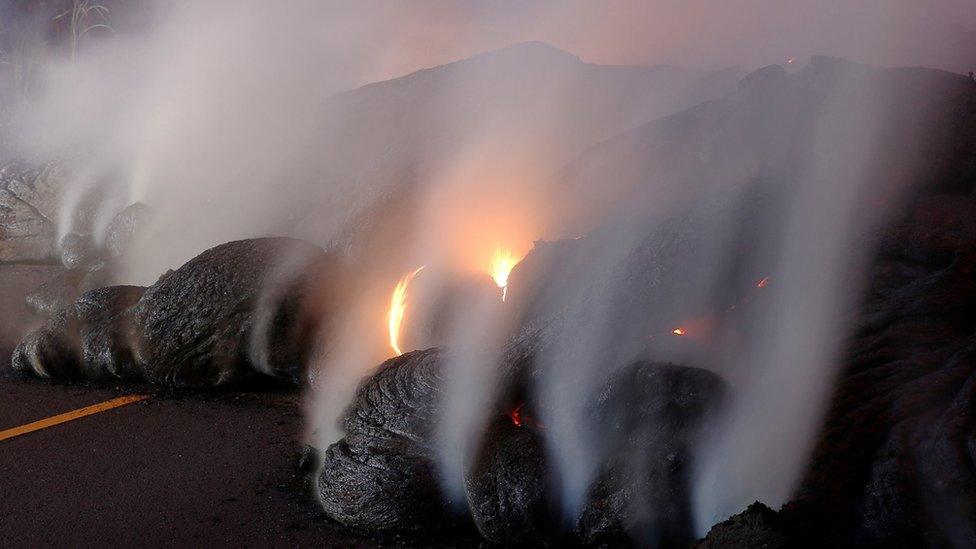 Volcanic gases rise from the Kilauea lava flow that crossed Pohoiki Road near Highway 132, near Pahoa, Hawaii, US on 28 May 2018