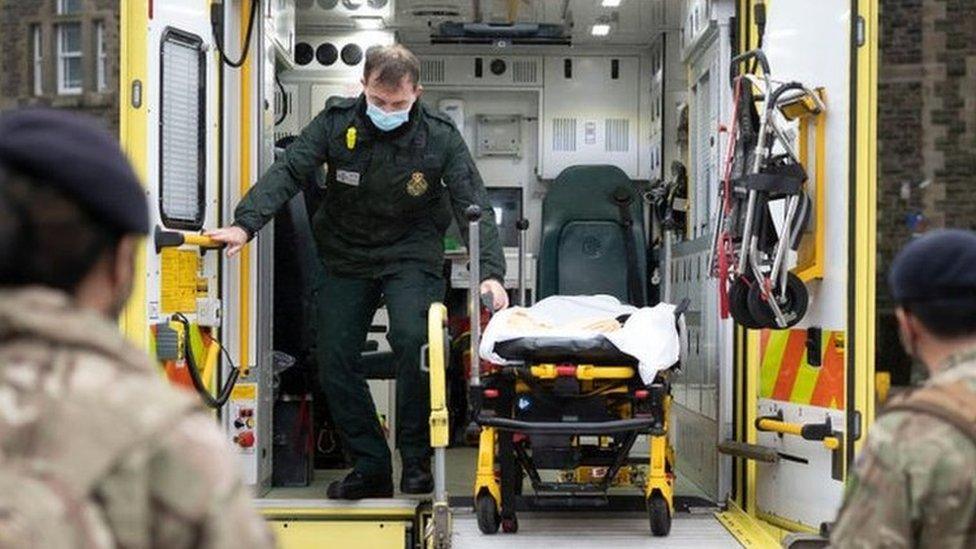 Soldiers at work on an ambulance