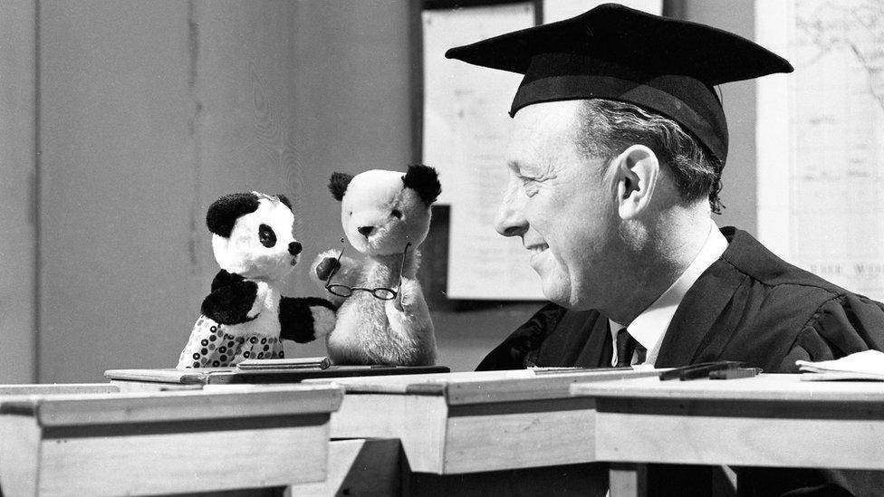 Sooty, Soo and Harry Corbett in a school scene in a BBC show in 1965