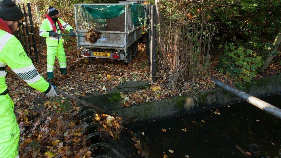 Environment Agency officers clearing watercourses