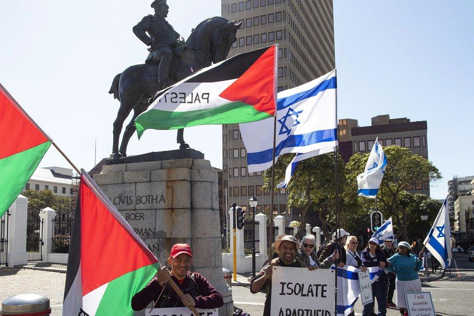 Rival protesters - some pro-Palestinian, others pro-Israel - stand outside parliament in Cape Town, South Africa - Friday 24 August 2018