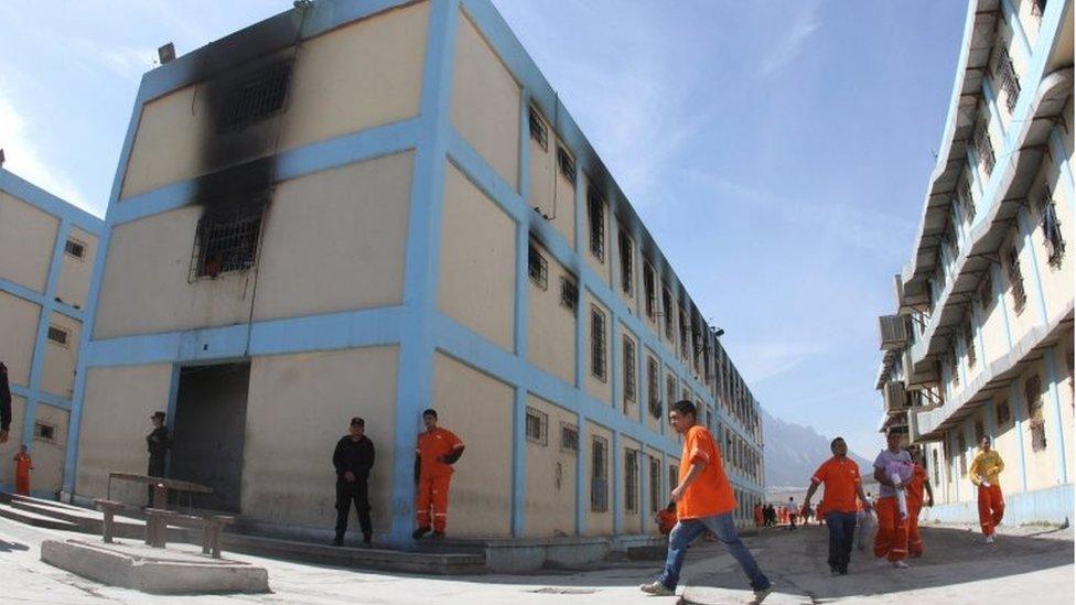 A handout picture provided by the Government of Monterrey shows police officers conducting a search in the Topo Chico Prison in Monterrey, Mexico, 14 February 2016