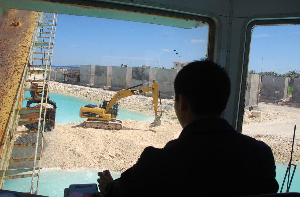 Construction workers building a jetty on Yongxing/Woody Island