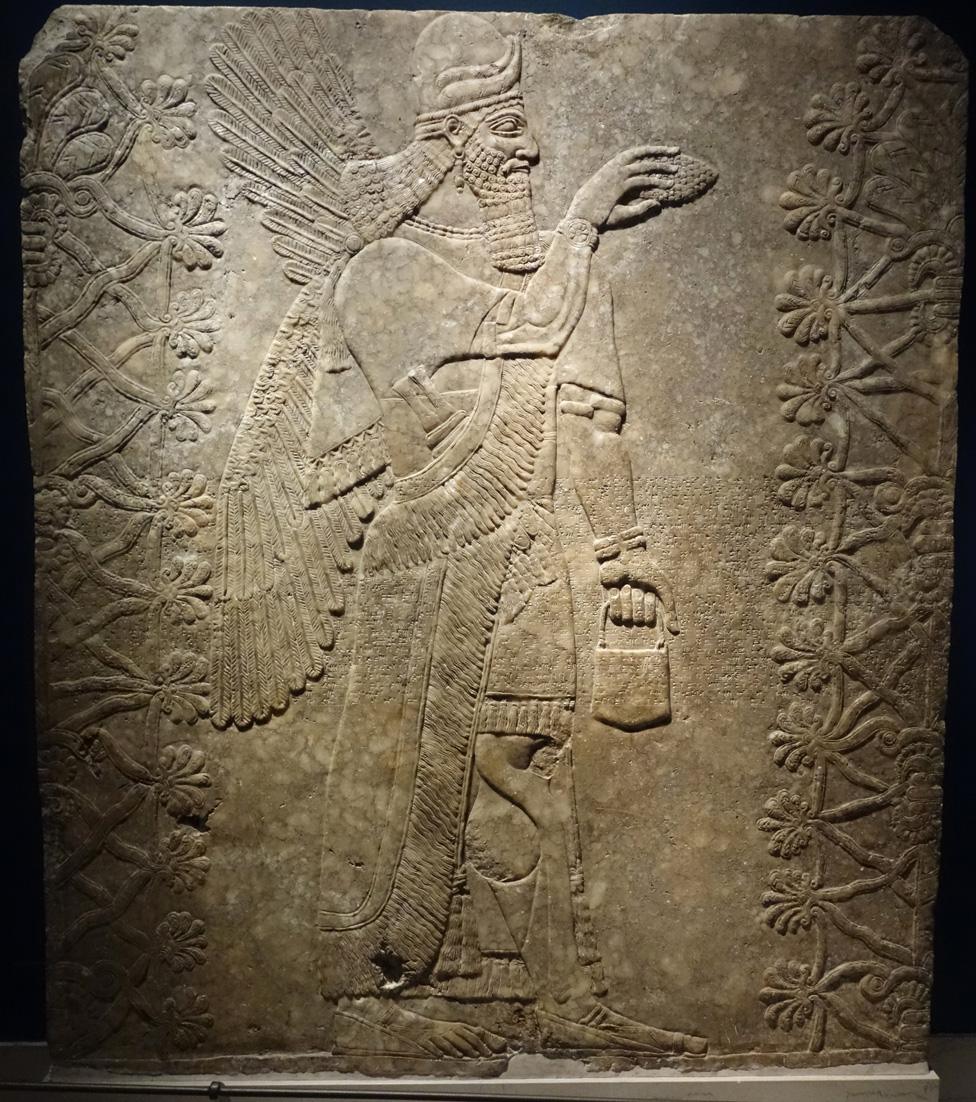 Genie of Nimrud, carved in stone