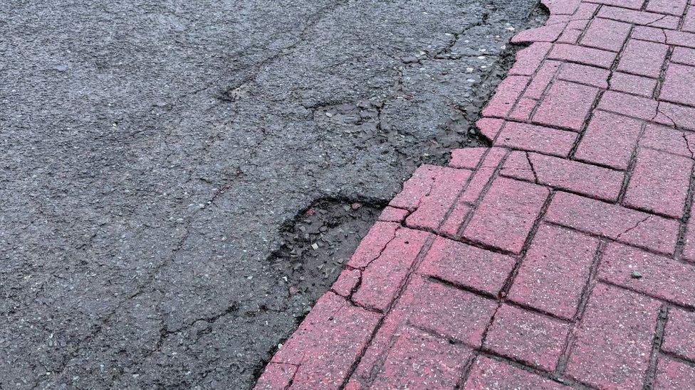 A pothole by a crossing on High Street in Chorley town centre