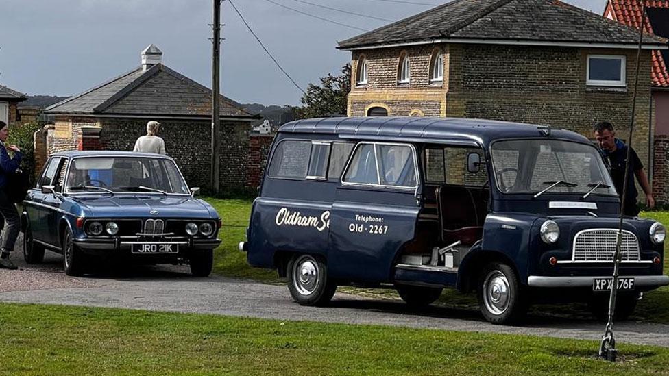 1950s or 60s-style car or van