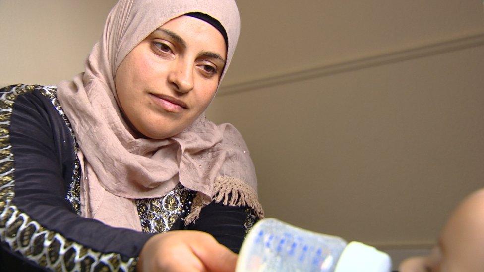 refugee in Glasgow with baby