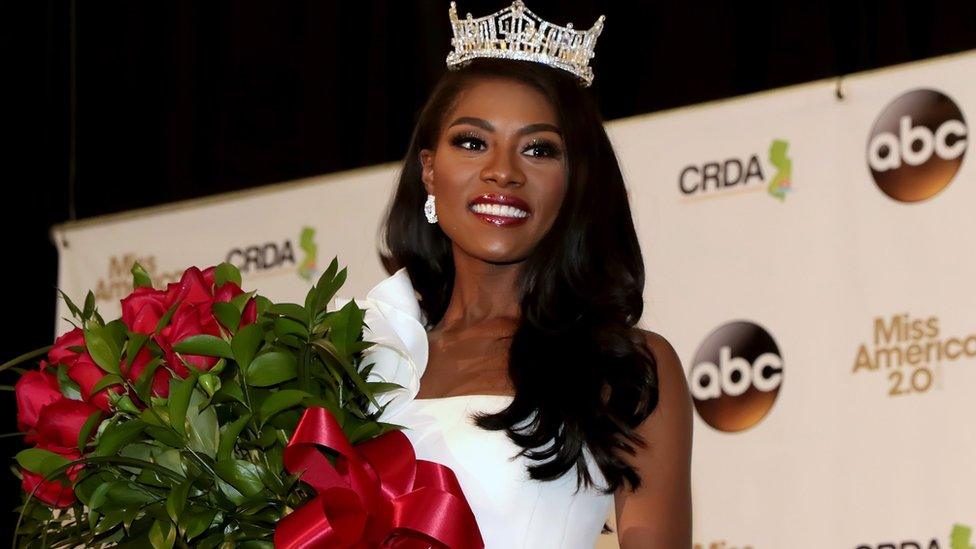 Miss New York wearing her crown with flowers