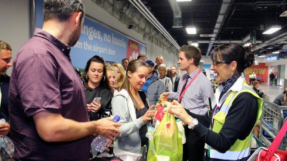 Passengers arriving back at Luton