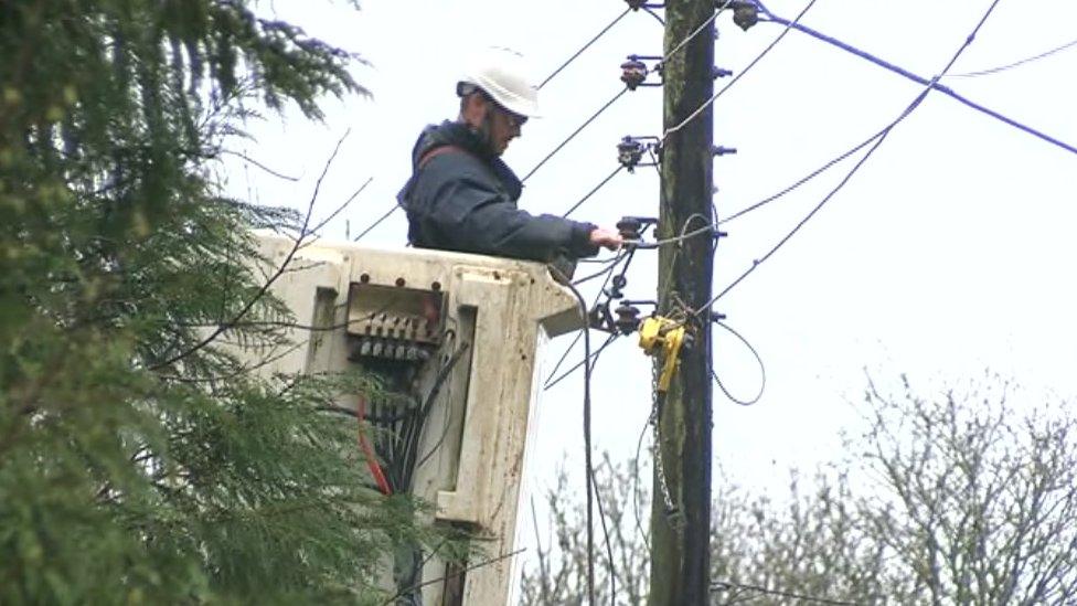 Power lines being fixed