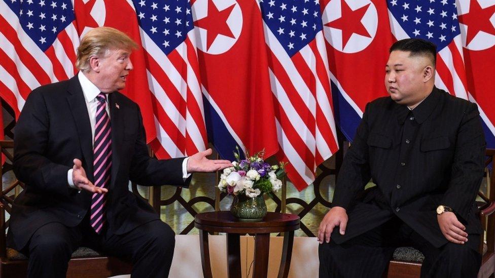 US President Donald Trump (L) speaks with North Korea"s leader Kim Jong Un during a meeting at the Sofitel Legend Metropole hotel in Hanoi on February 27, 2019.