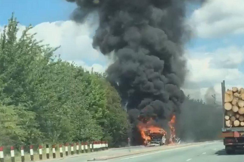 Bus on fire on A11