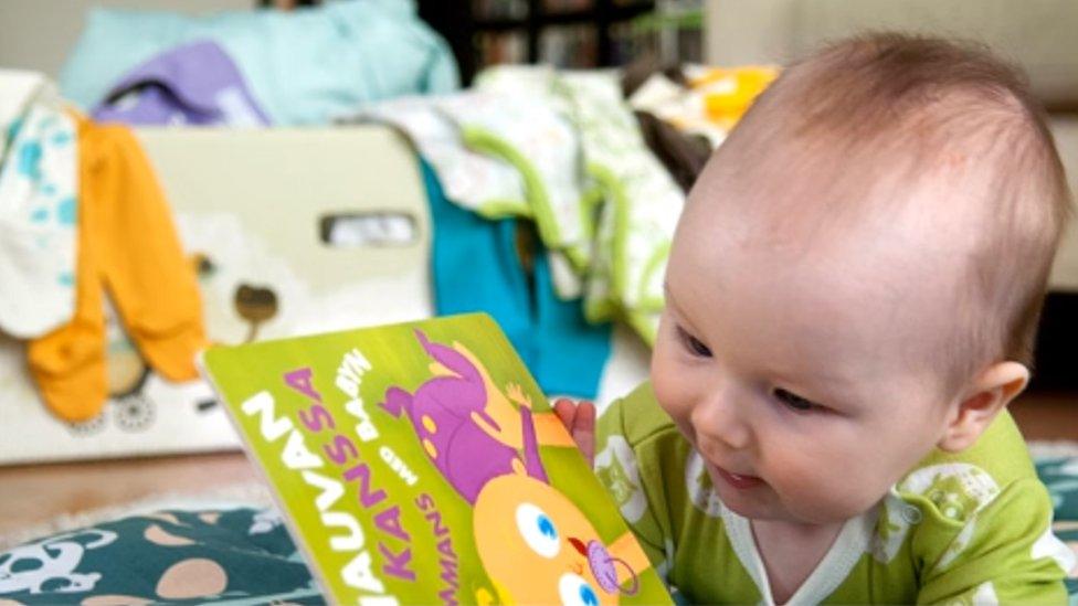 A Finnish baby with items from the 2015 maternity box