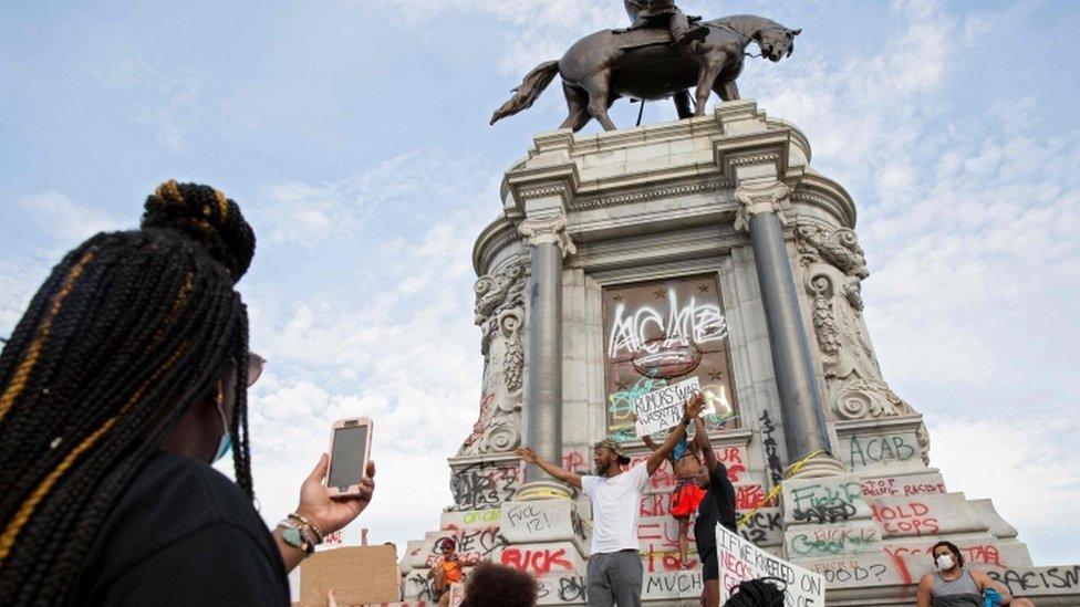 Protesters gather at a Confederate statue in Richmond