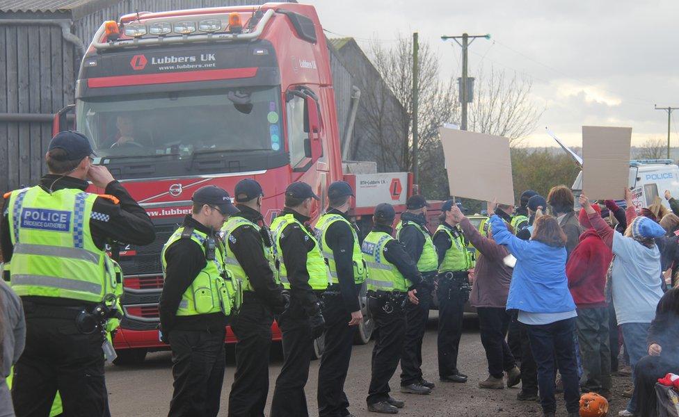 Trucks leave site