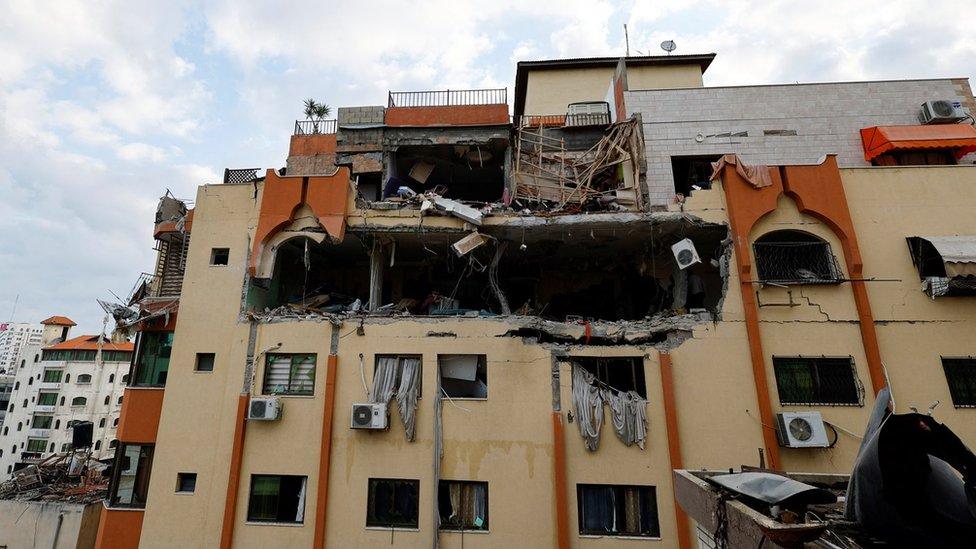 Apartment building in Gaza City damaged by an Israeli air strike that killed Islamic Jihad leader Tareq Ezzedine and two of his children, as well as his neighbour dentist Dr Jamal Khaswan, his wife and their son (9 May 2023)