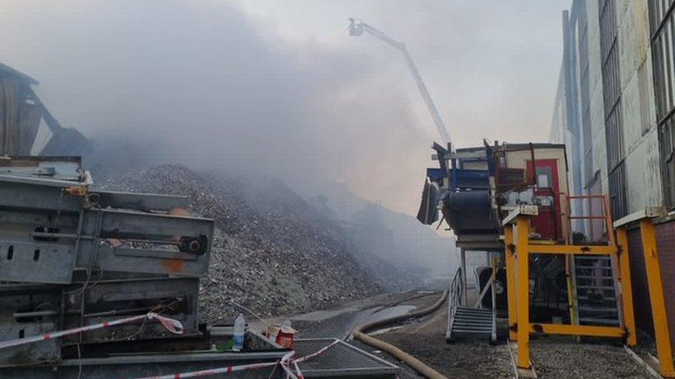 Fire crews continue to douse the blaze in Park Farm Road, Scunthorpe