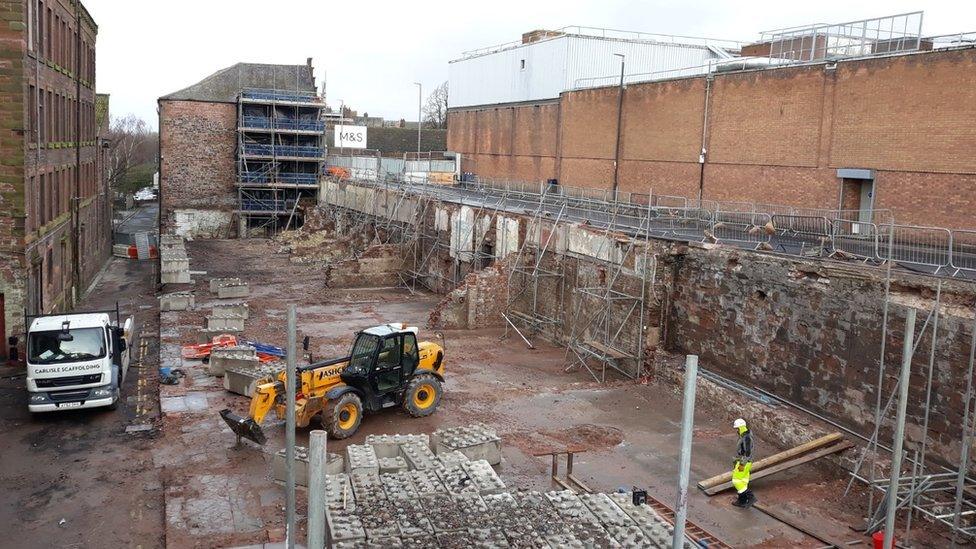 Demolition teams at work in 2020 on the site formerly home to the Central Plaza hotel