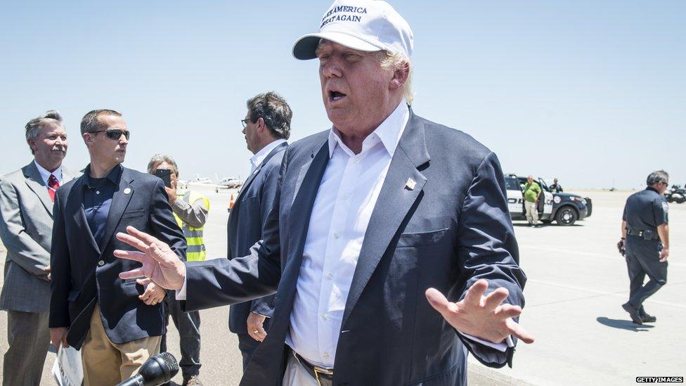 Donald Trump speaks to the media at the airport in Laredo, Texas.