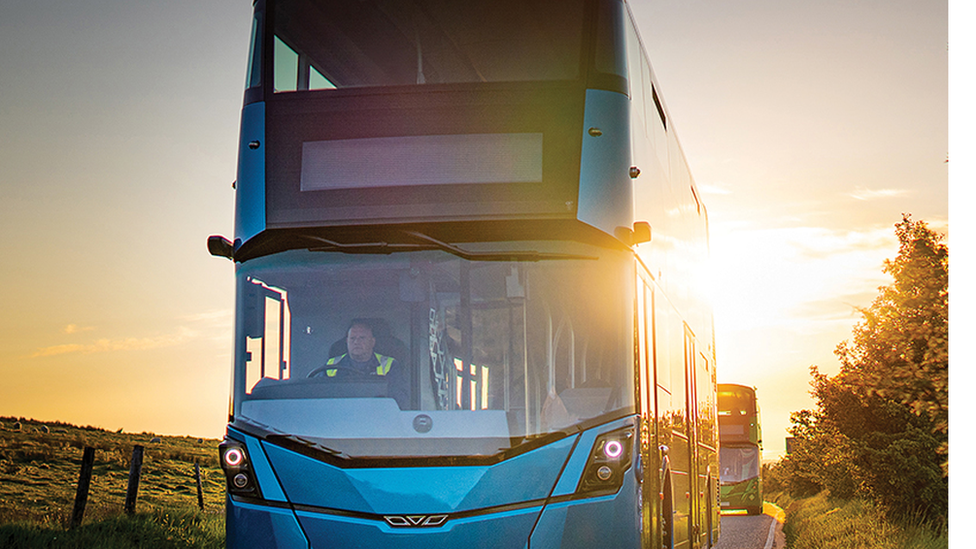 Buses being driven on a road