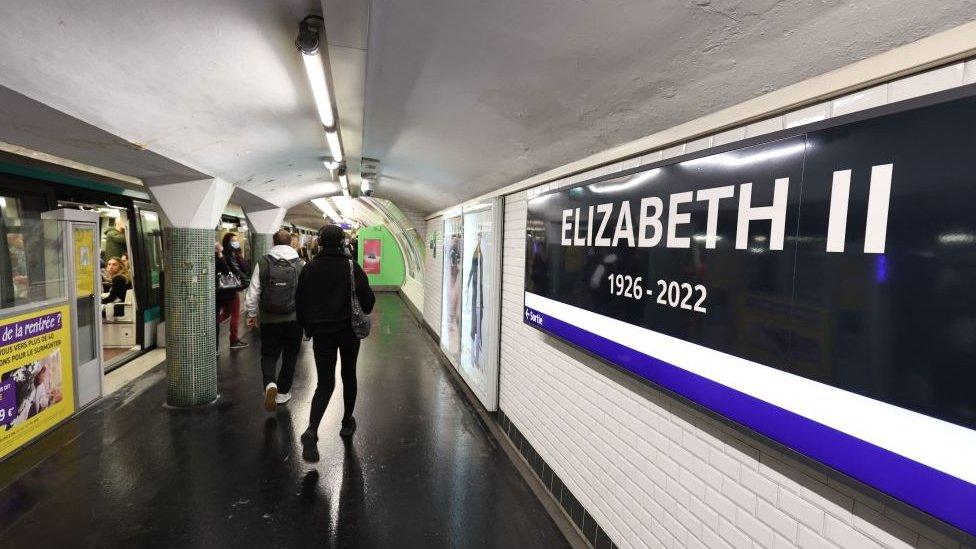 French metro station with "Elizabeth II" written on the wall.