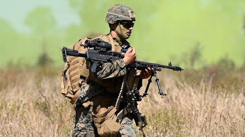 A US Marine from MRF-D (Marine Rotational Force Darwin) participates in an urban assault as part of Exercise 'Talisman Sabre 21' on July 27, 2021 in Townsville, Australia.