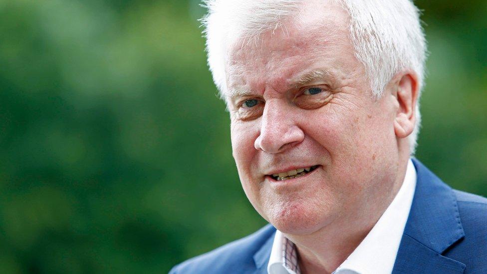 Bavarian state premier and leader of the Christian Social Union (CSU) Horst Seehofer arrives for a news conference in Sankt Quirin, Germany, July 26, 2016.