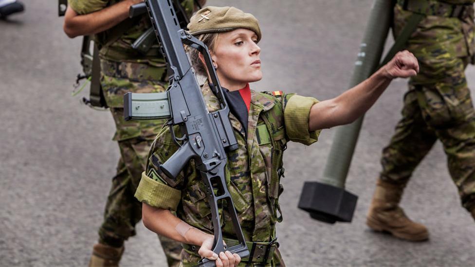 Woman soldier marching in Madrid, 12 Oct 18