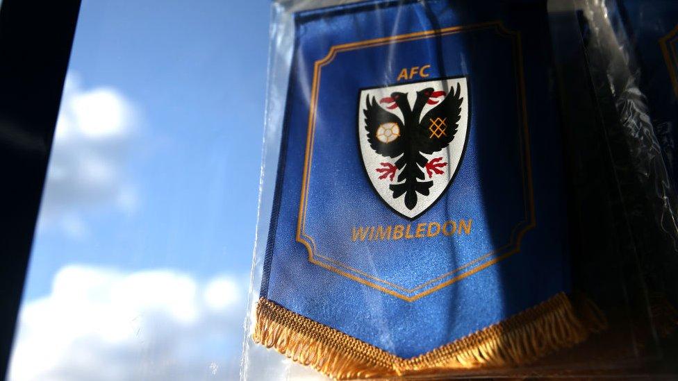 AFC-Wimbledon-badge-being-sold.