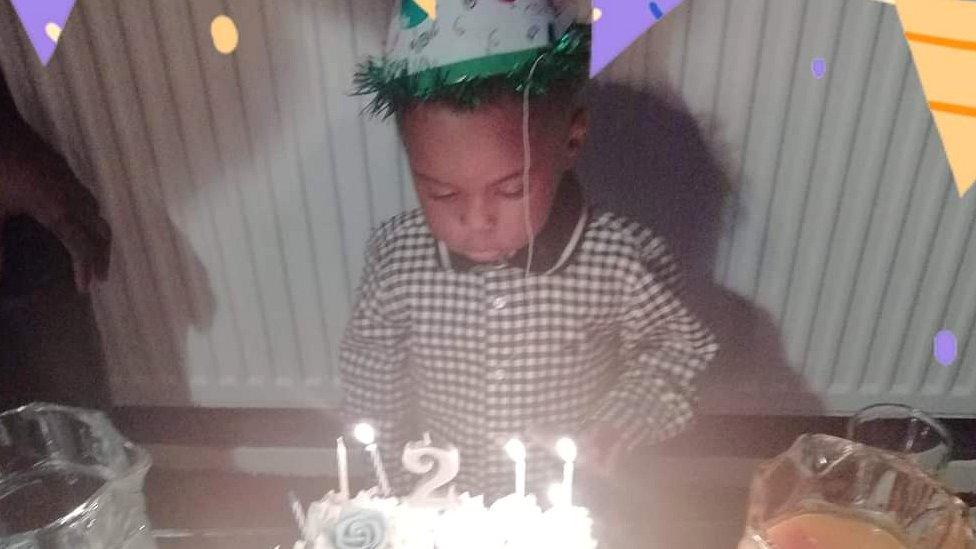 Awaab Ishak with his birthday cake