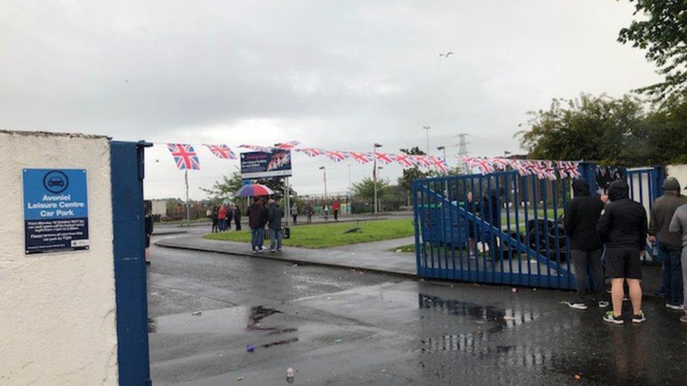 Union flag bunting at the gates of Avoniel Leisure Centre