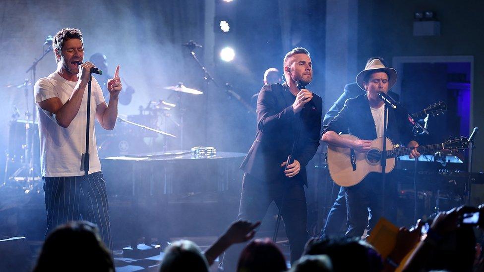 Take That now perform as a three-piece