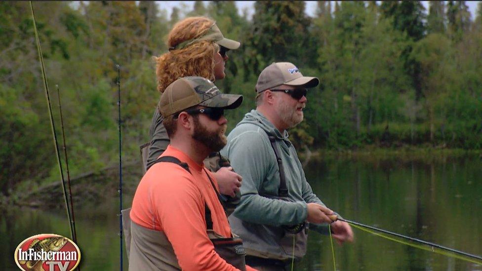 Three men fishing