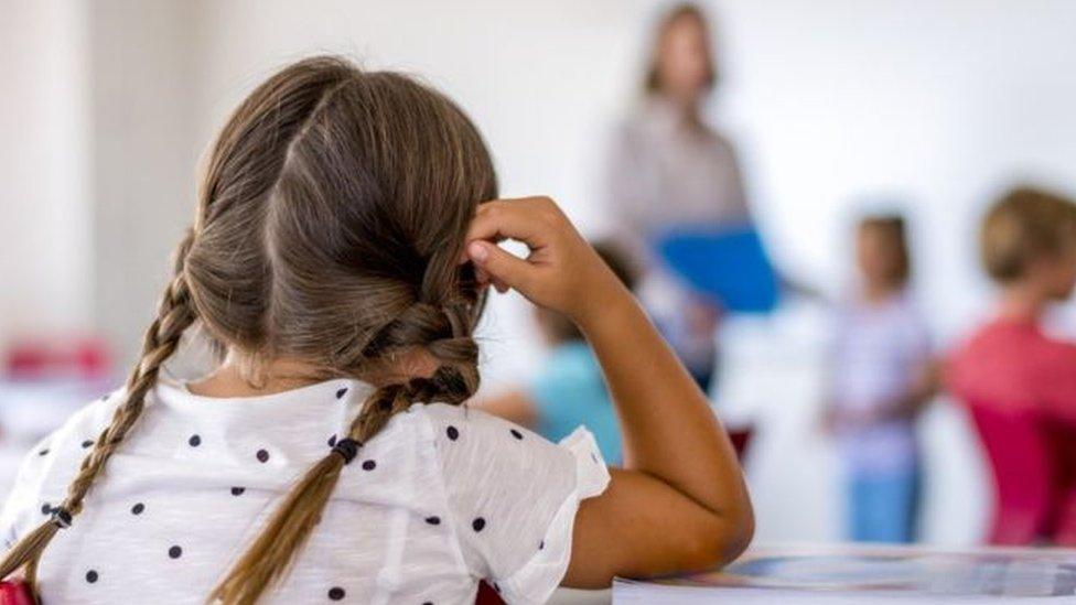 A child in a classroom - library picture