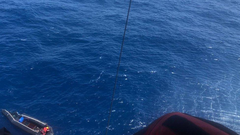 Spain's maritime rescue service airlifted the woman to safety after she was spotted by a passing merchant ship