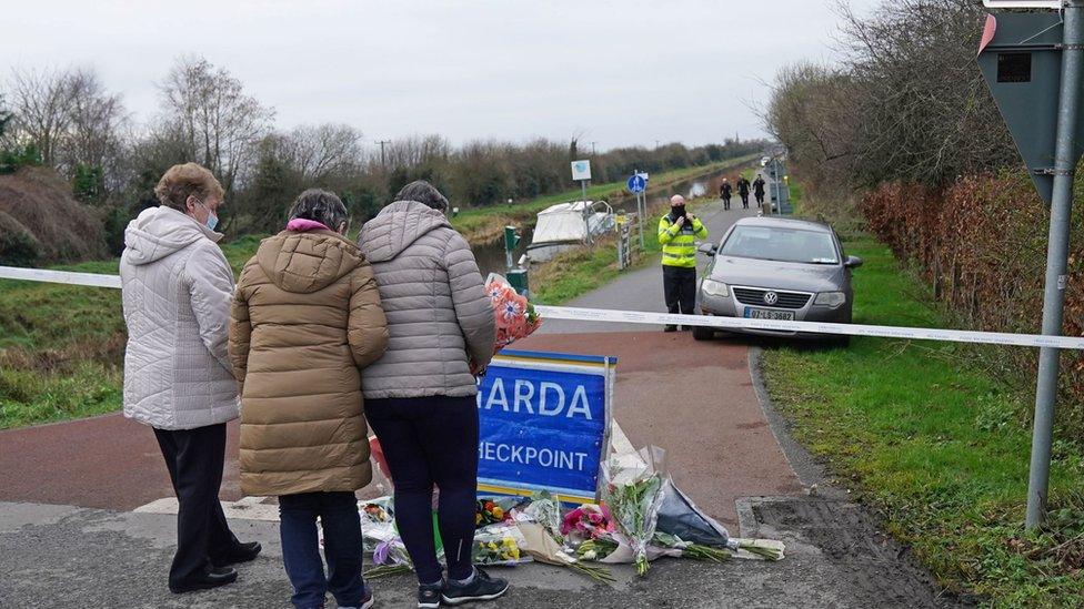 Floral tributes have been laid at the cordon