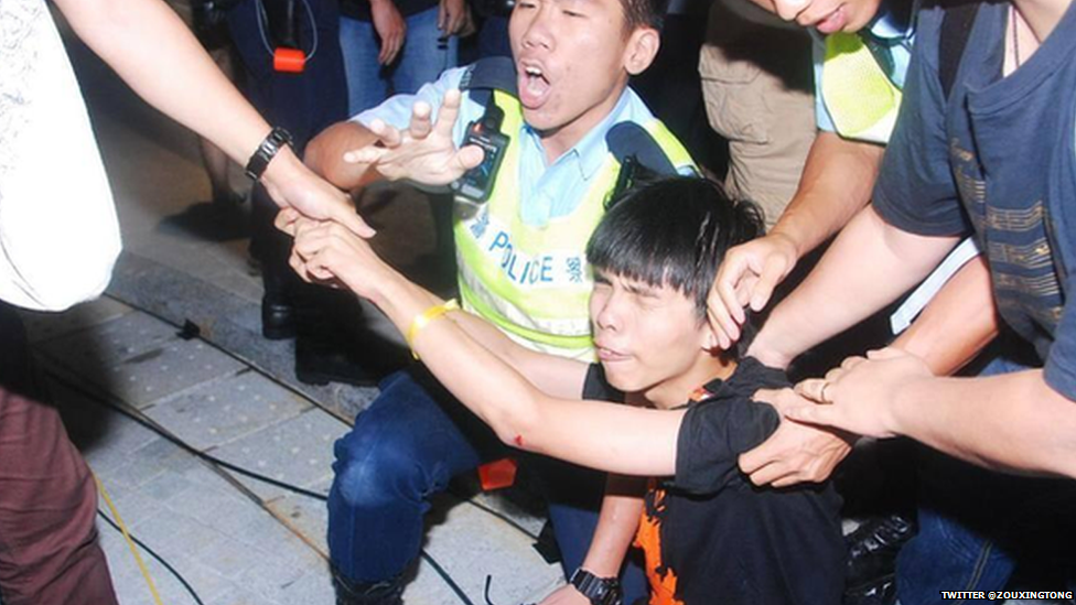 Joshua Wong being arrested