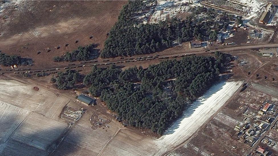 A handout satellite image made available by Maxar Technologies shows resupply trucks and probable multiple rocket launch deployment in Berestyanka, Ukraine. Photo: 10 March 2022