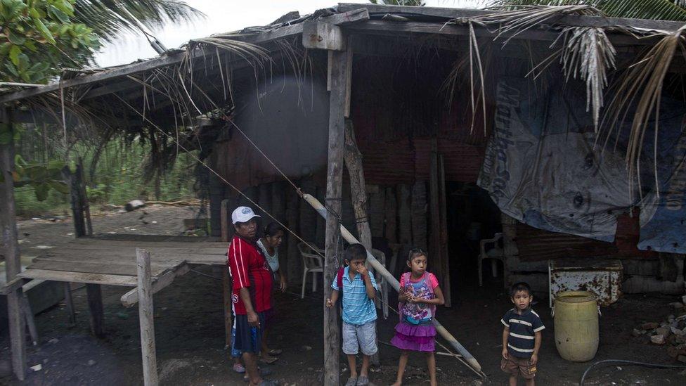 Kids in Mexico preparing for the storm.