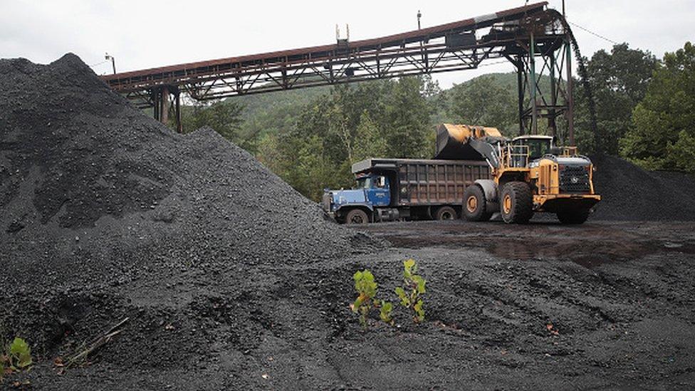 A truck is loaded with coal at a mine near Cumberland, Kentucky