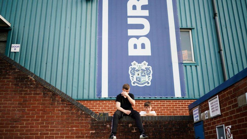 bury fans upset at the closure of their club in 2019