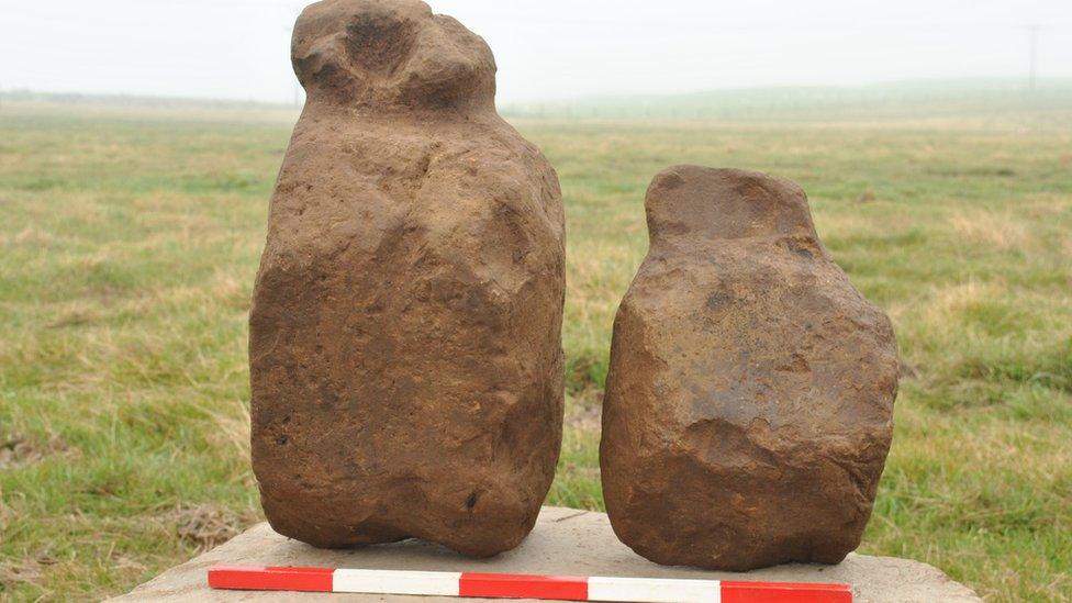 Two carved stones