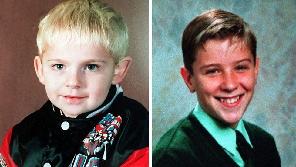 Left: Johnathan Ball, white boy with blonde hair. Right: Tim Parry, white boy with brown hair, smiling.