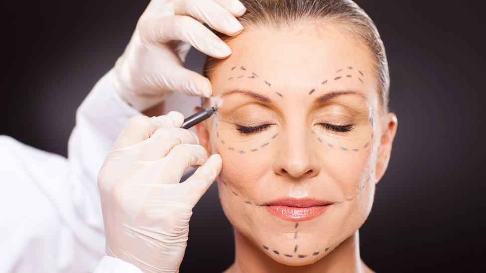 Woman preparing for cosmetic surgery