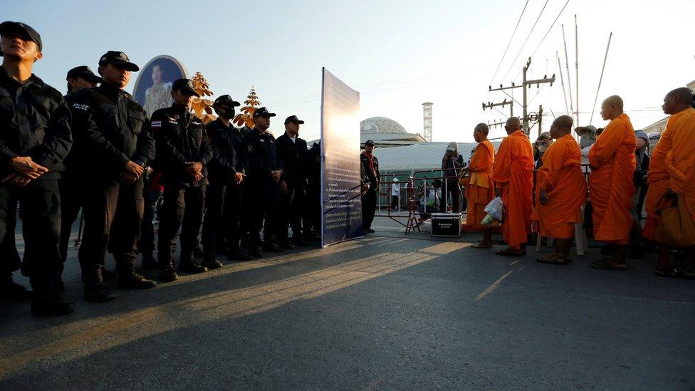 Thai police block Buddhist monks at the gate of Dhammakaya temple in Pathum Thani province, Thailand February 16, 2017.