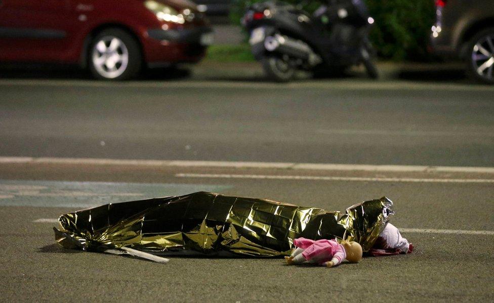 A body is seen on the ground in Nice, France, after a truck ran into a crowd celebrating the Bastille Day national holiday