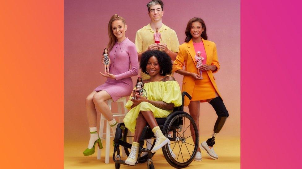 Rose Ayling-Ellis alongside a cast of diverse models who reflect the new line of Barbie dolls, which includes the first Ken doll with vitiligo, one with a prosthetic limb, one with hearing aids and another with a wheelchair.