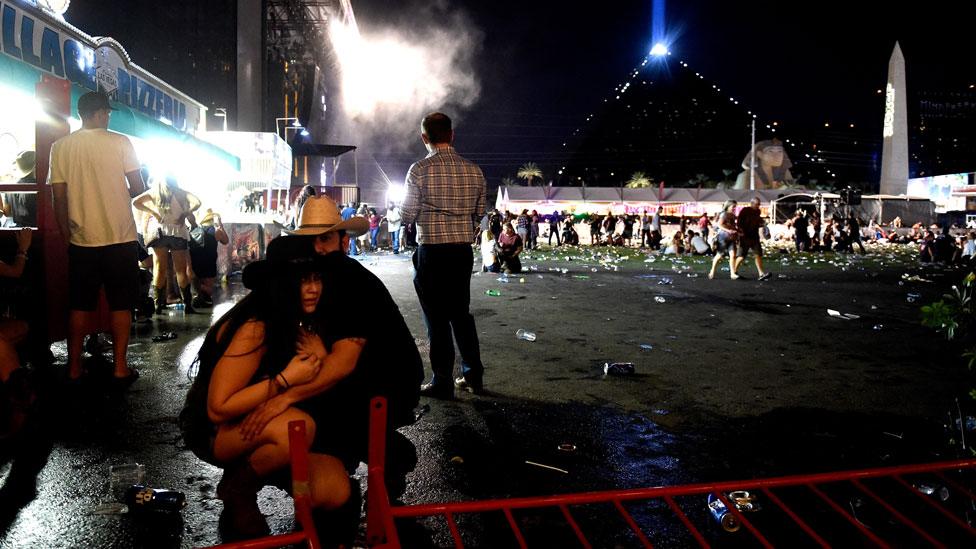 People take cover during shooting