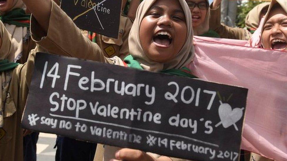 Muslim students shout slogans during a protest against Valentine's Day celebrations in Surabaya, Indonesia, on 13 February, 2017