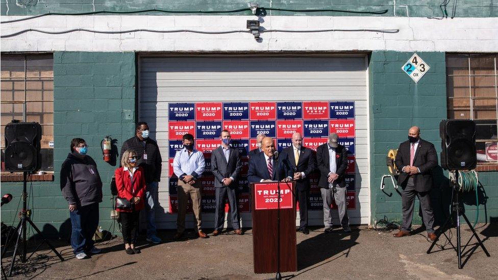 Rudy Giuliani speaks at the Four Seasons Total Landscaping press conference